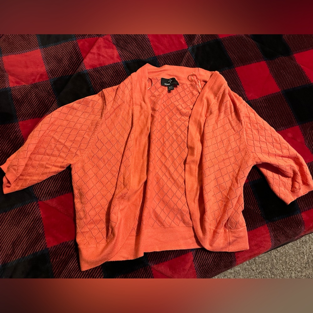 Orange sweater with shirt sleeves